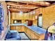 Functional kitchen provides ample counter space and storage within wood cabinetry at 15602 N 37Th St, Phoenix, AZ 85032