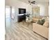 Inviting living room with plush seating, modern decor, and a seamless transition to outdoor space at 15602 N 37Th St, Phoenix, AZ 85032