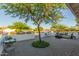 Charming outdoor patio with comfortable seating, decorative plants, and a beautiful brick-paved surface at 15602 N 37Th St, Phoenix, AZ 85032