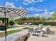 Inviting patio with comfortable outdoor furniture, perfect for entertaining or relaxing by the pool at 15602 N 37Th St, Phoenix, AZ 85032