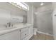 Bathroom featuring double sinks, large mirror and a separate shower at 15822 W Alpine Ridge Dr, Surprise, AZ 85374