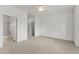 Spacious main bedroom with carpet and ensuite bath and walk-in closet at 15822 W Alpine Ridge Dr, Surprise, AZ 85374
