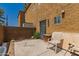 Secluded backyard patio with privacy wall, gated access, and ample space for relaxation at 16225 N 30Th St # 11, Phoenix, AZ 85032