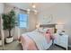 Cozy bedroom featuring elegant decor, accent lighting and plush bedding at 16381 W Weeping Willow Rd, Surprise, AZ 85387