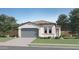 Charming single-story home with a well-manicured lawn and a two-car garage in a friendly neighborhood at 16677 W Chama Dr, Surprise, AZ 85387