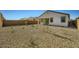 A backyard with gravel throughout and a newly built fence at 16754 W Alameda Rd, Surprise, AZ 85387