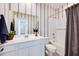 Well-lit bathroom with a single vanity and a shower-tub combo providing a functional and clean space at 16754 W Alameda Rd, Surprise, AZ 85387