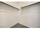 Walk-in closet with carpeted floor and white walls at 16754 W Alameda Rd, Surprise, AZ 85387
