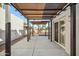 The spacious back patio features a pergola, concrete flooring and easy access to the home at 17019 E Calaveras Ave, Fountain Hills, AZ 85268