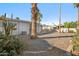 Backyard with mature palm trees and desert landscaping create a serene outdoor space at 17019 E Calaveras Ave, Fountain Hills, AZ 85268