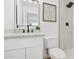 Beautiful bathroom featuring black hardware, updated vanity, and a framed mirror at 17019 E Calaveras Ave, Fountain Hills, AZ 85268