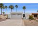 Inviting single-story home featuring a desert landscaped yard and attached two car garage at 17019 E Calaveras Ave, Fountain Hills, AZ 85268