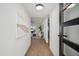 Bright hallway leading to a spacious living area, featuring modern decor and hardwood floors at 17019 E Calaveras Ave, Fountain Hills, AZ 85268