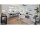 Bright open-concept living room featuring modern furnishings and sliding glass doors to the backyard at 17019 E Calaveras Ave, Fountain Hills, AZ 85268