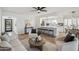 Inviting living room boasts an open layout with a kitchen view and modern furnishings at 17019 E Calaveras Ave, Fountain Hills, AZ 85268