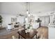 Open living space showcasing kitchen island, dining area and cozy seating at 17019 E Calaveras Ave, Fountain Hills, AZ 85268