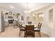 Cozy kitchen featuring modern appliances, ample counter space, and a breakfast nook at 17718 N Desert Flower Trl, Surprise, AZ 85374