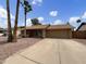 Well-maintained single-story home with a two-car garage, landscaped front yard, and inviting curb appeal at 1913 N Verano Way, Chandler, AZ 85224