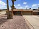 Charming single-story home with a well-maintained yard and a spacious two-car garage at 1913 N Verano Way, Chandler, AZ 85224