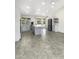 Large open kitchen with modern appliances, ample counter space, and an island at 1913 N Verano Way, Chandler, AZ 85224