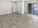 Spacious main bedroom with tiled floors and large sliding door to the outside patio at 1913 N Verano Way, Chandler, AZ 85224