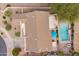 Aerial view of the property with a sparkling pool and neatly landscaped surroundings at 19537 E Thornton Rd, Queen Creek, AZ 85142