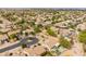 An aerial view highlights a well-planned community with mature trees at 19537 E Thornton Rd, Queen Creek, AZ 85142