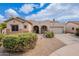 Single-story home with desert landscaping including cactus and mature shrubbery at 19537 E Thornton Rd, Queen Creek, AZ 85142