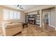 Living room offers a comfortable seating area and media center with built-in shelving at 19537 E Thornton Rd, Queen Creek, AZ 85142
