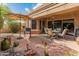 Outdoor patio space perfect for relaxing, with multiple seating areas at 19874 N 90Th Ave, Peoria, AZ 85382