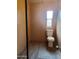 Simple, functional bathroom featuring a toilet and vinyl floors, clean and ready for customization at 200 E Ivanhoe St, Chandler, AZ 85225