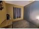 Comfortable bedroom with natural light, golf clubs, and a window at 200 E Ivanhoe St, Chandler, AZ 85225