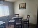 Cozy dining area with a round table and four chairs at 200 E Ivanhoe St, Chandler, AZ 85225