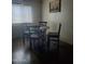 Cozy dining area with a round table and four chairs, perfect for enjoying intimate meals at 200 E Ivanhoe St, Chandler, AZ 85225