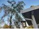 A house exterior with a decorative bird house hanging near the gutter at 200 E Ivanhoe St, Chandler, AZ 85225