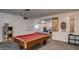 Spacious game room with a billiard table, providing ample space for entertainment and recreation at 200 E Ivanhoe St, Chandler, AZ 85225