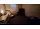 Living area with a desk, chair, TV, and comfortable seating. A relaxing space at 200 E Ivanhoe St, Chandler, AZ 85225