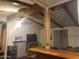 Living room featuring wood beam accents and entertainment center at 200 E Ivanhoe St, Chandler, AZ 85225
