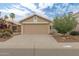 Charming single-story home featuring a desert landscape, and a two-car garage at 2112 E Donald Dr, Phoenix, AZ 85024