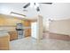 The kitchen has stainless steel appliances, granite countertops, and ample storage at 2112 E Donald Dr, Phoenix, AZ 85024