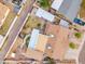 Aerial view showcasing the home's layout, including a covered patio and pergola, within a residential neighborhood at 2217 N 51St Ln, Phoenix, AZ 85035