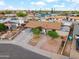 Charming single-story home featuring desert landscaping, a covered carport, and mature trees in a well-maintained neighborhood at 2217 N 51St Ln, Phoenix, AZ 85035