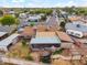 Aerial view highlighting the home's backyard, covered patio, landscaping, and location in a peaceful neighborhood at 2217 N 51St Ln, Phoenix, AZ 85035
