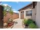Charming backyard with brick walls, landscaping and concrete walkway at 2217 N 51St Ln, Phoenix, AZ 85035