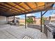 Wonderful covered patio with a grill and an outdoor fireplace at 2217 N 51St Ln, Phoenix, AZ 85035
