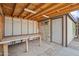 Storage with a built-in work table, and an entry door at 2217 N 51St Ln, Phoenix, AZ 85035