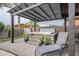 Backyard featuring a covered hot tub, patio with pavers, and lounge chair at 2525 W Balao Dr, Phoenix, AZ 85085