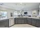 Open kitchen design with stainless steel dishwasher and granite counters overlooking the living room at 2525 W Balao Dr, Phoenix, AZ 85085