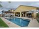 Inviting backyard pool and spa with patio seating, perfect for outdoor relaxation and entertaining at 2525 W Balao Dr, Phoenix, AZ 85085