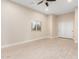 Another view of a bedroom with sliding-door closet and a ceiling fan at 25450 W Pueblo Ave, Buckeye, AZ 85326
